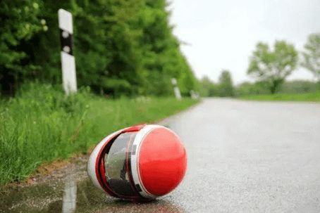 motorcycle helmet in the road